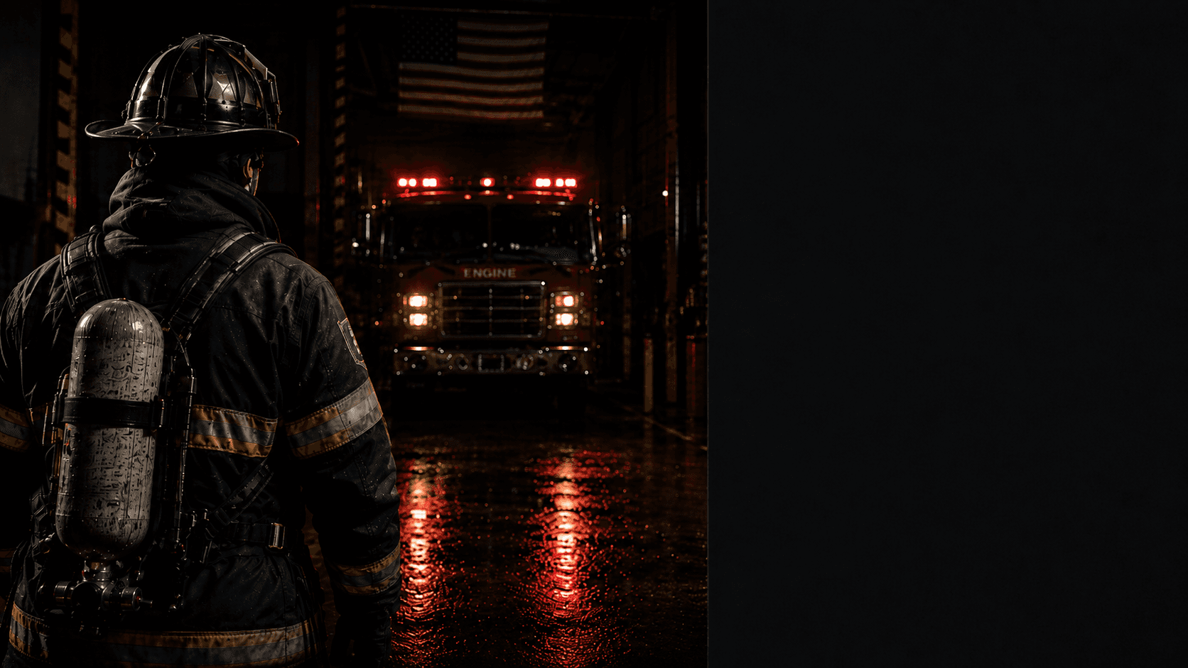 Firefighter standing in front of engine